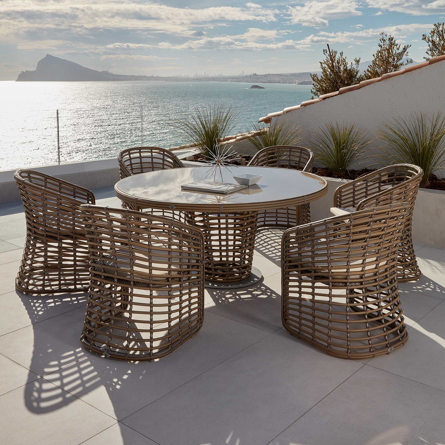 Ruby 7-Piece Dining Set with Round Table and Sunbrella Cushions